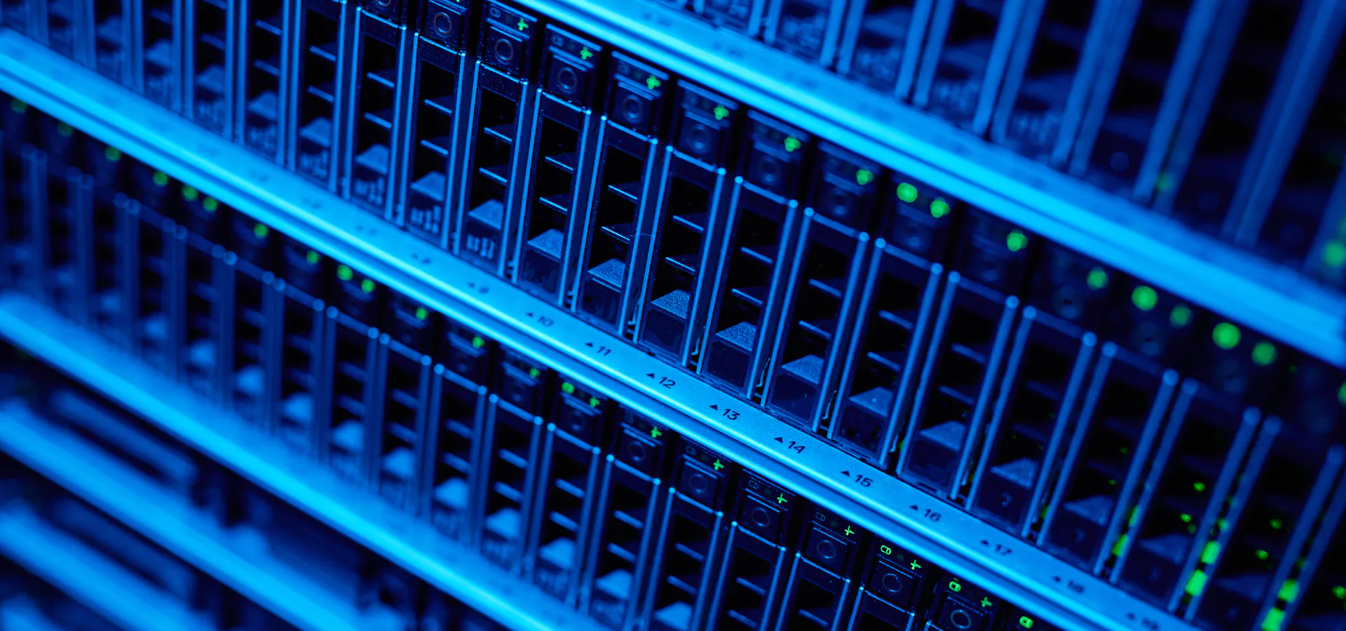 Engagement Models: close-up of blue-lit data center server racks