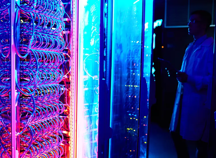 Ready-Made Components – Adobe Experience Manager Consulting company Ready-Made Components – Adobe Experience Manager Consulting company: technician inspecting illuminated server cabling